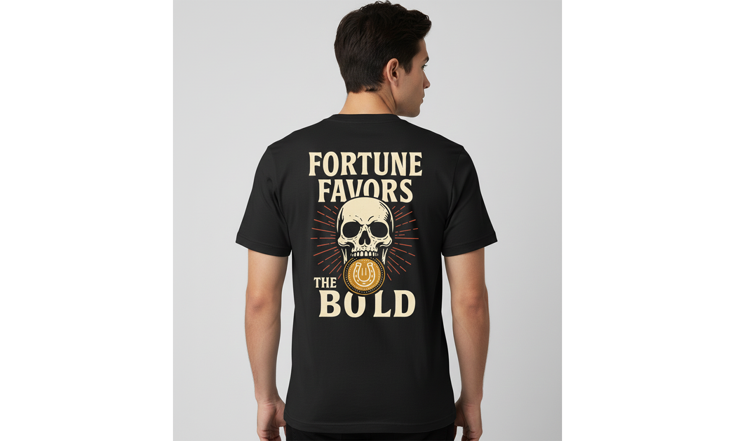 Person wearing a black t-shirt with a skull design and text on the back, on a plain background