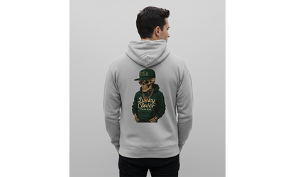 Person wearing a gray hoodie with a graphic of a person in a green cap on the back, against a light gray background