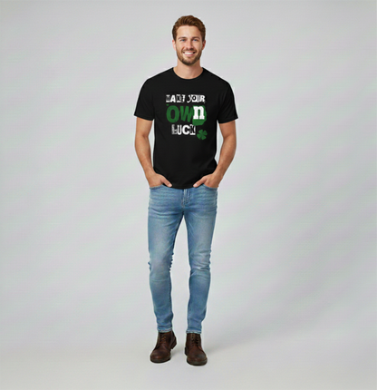 Man wearing a black t-shirt with text and graphics, standing against a plain background