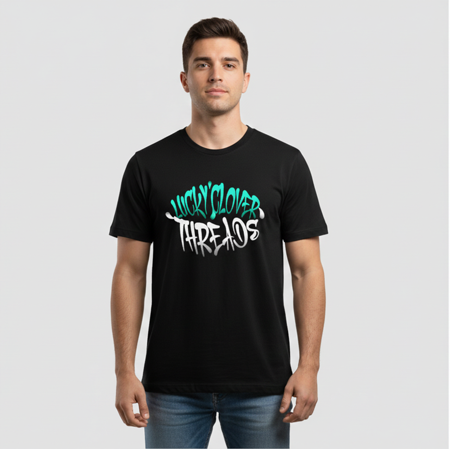 Man wearing a black t-shirt with colorful text on a light gray background