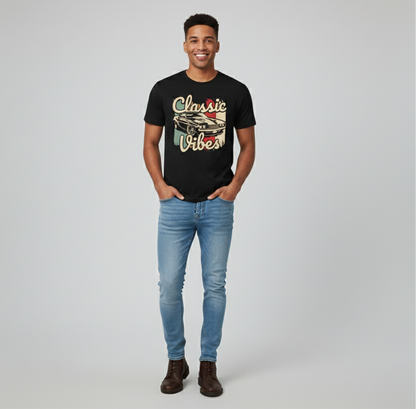 Man wearing a black t-shirt with 'Classic Vibes' text and graphics, paired with blue jeans on a light gray background.