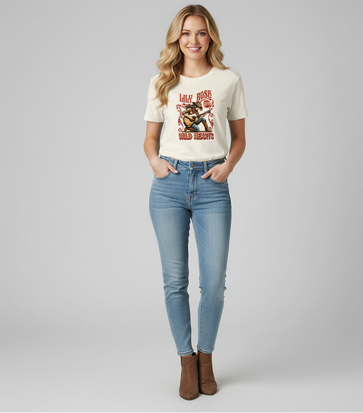 Woman wearing a graphic t-shirt and jeans on a gray background