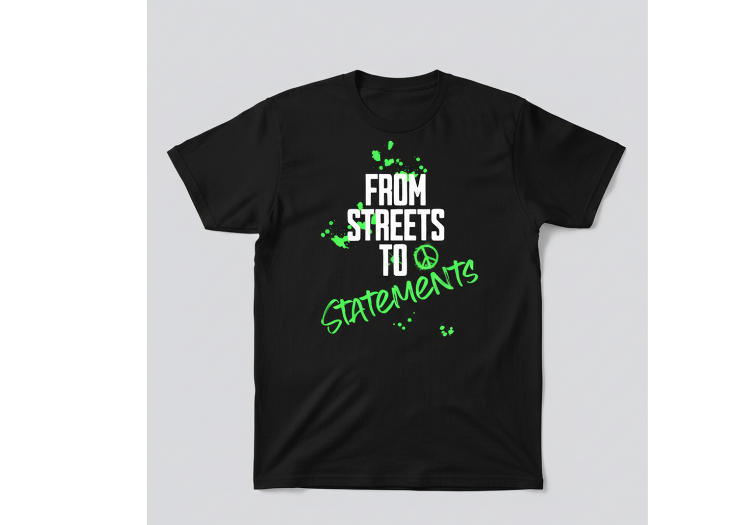 Black t-shirt with white and green text on a light gray background