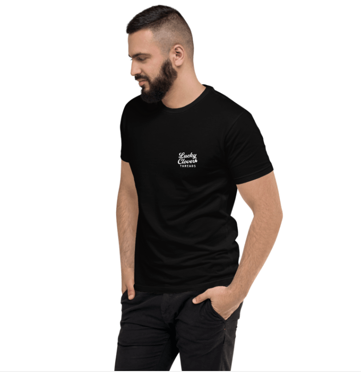Man wearing a black t-shirt with a logo on a white background