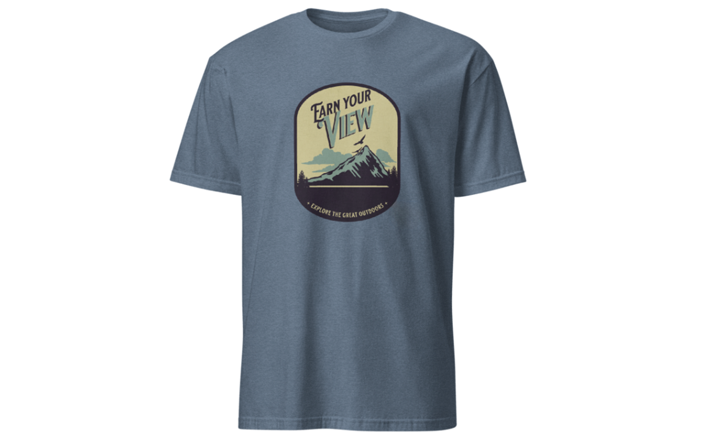 Blue t-shirt with a mountain graphic and text on a white background