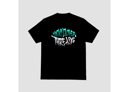 Black t-shirt with colorful text design on a light gray background