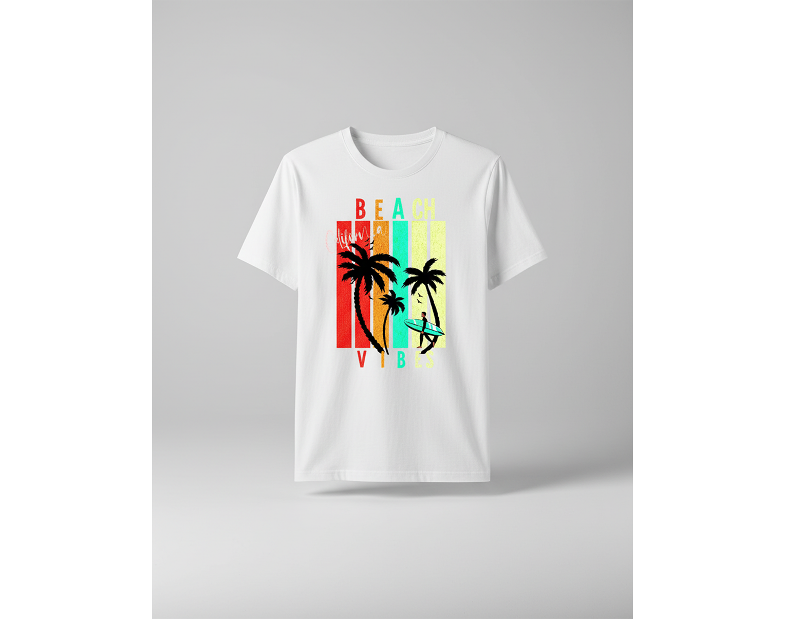 White t-shirt with a colorful beach graphic on a gray background